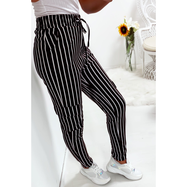 Pantalon jegging rayé noir et blanc avec poches sur les cotés - 1