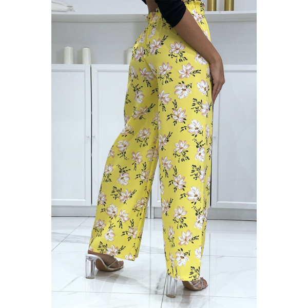 Pantalon palazzo jaune avec motif fleuris - 1